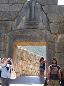 Justin, resident rock star, standing below the famous Lion's Gate